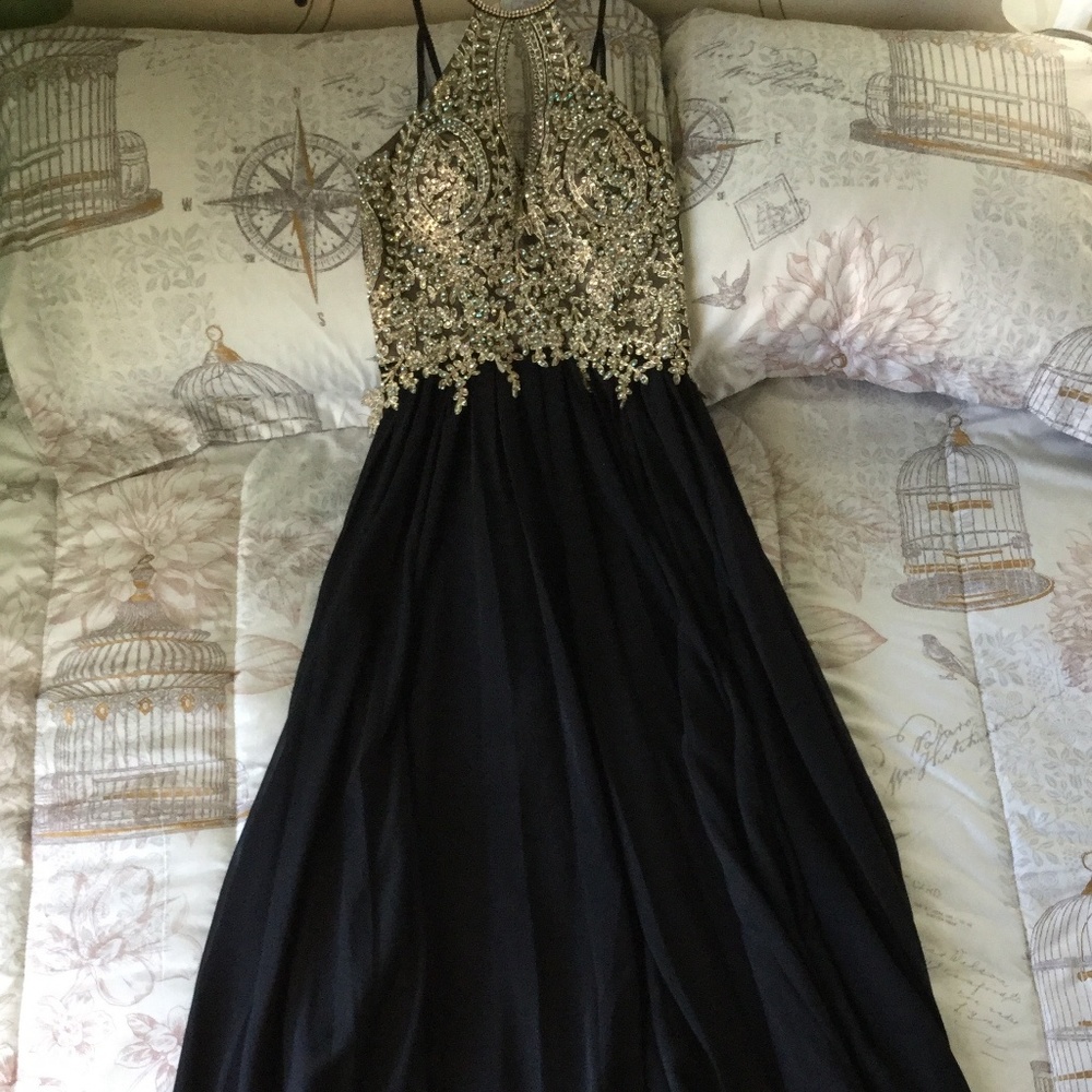 Black and gold prom or formal wear dress.